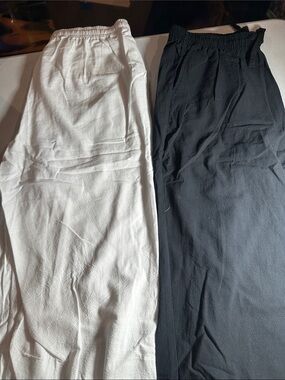 2 pack of Women's lightweight pants. One white and one black pair of medium pant